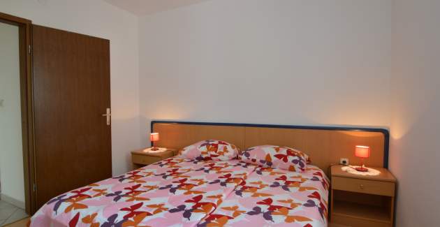 Apartment Luana 2 steps from Valdarke beach for three people, Mali Lošinj