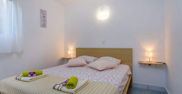Apartment Slavicek 1 comfortable accommodation near the sea Artatore, Mali Lošinj