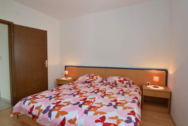 Apartment Luana 2 steps from Valdarke beach for three people, Mali Lošinj