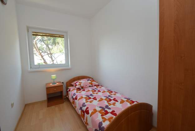 Apartment Luana 2 steps from Valdarke beach for three people, Mali Lošinj