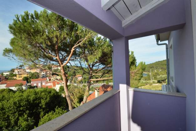 Apartment Luana 2 steps from Valdarke beach for three people, Mali Lošinj