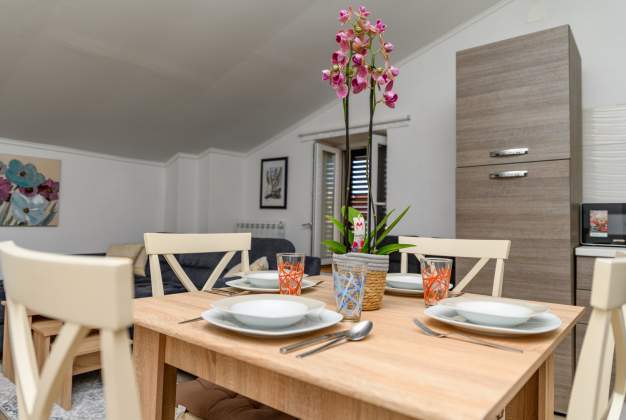 Apartment Aleks 1 Located in attractive location surrounded by flowers apartment for 2 people.