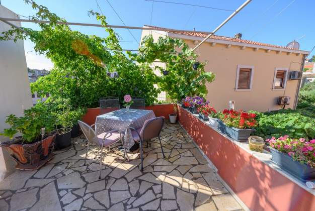 Apartment Aleks 1 Located in attractive location surrounded by flowers apartment for 2 people.