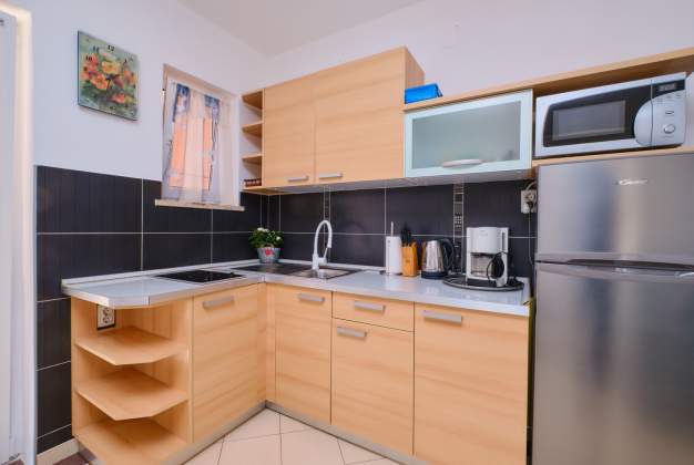 AApartment Orangina 1, close to the center and the beach of St. Martin, Mali Lošinj