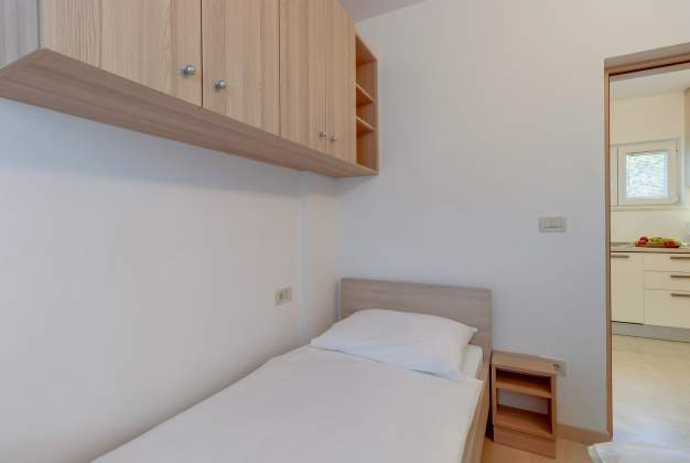 Ferienwohnungen Pineta 1 moderne Wohnung für 6 Personen im Herzen von Artatore, Kroatien.