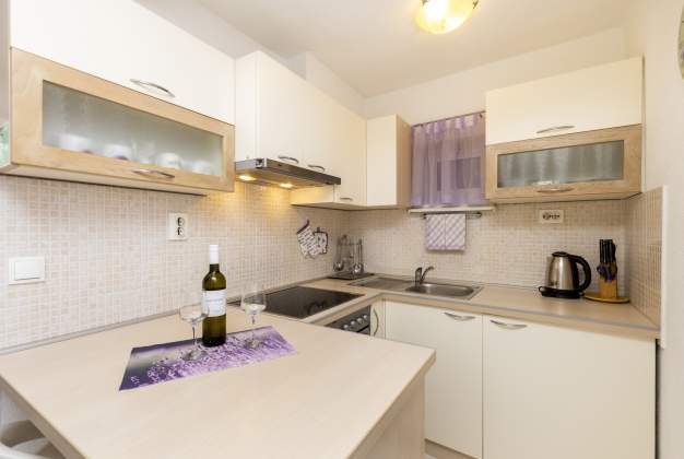Apartment Sandra 2 near Kadin beach, for two people, Mali Lošinj