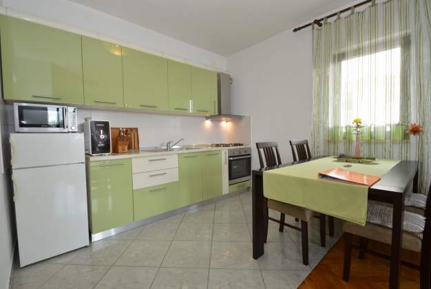 Apartma Tia 1 - nahaja se tik ob zalivu Sveti Martin za 3 osebe, Mali Lošinj, Hrvaška.