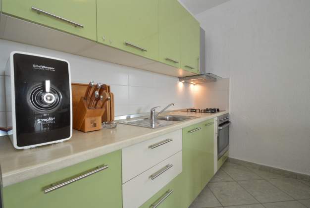 Apartma Tia 1 - nahaja se tik ob zalivu Sveti Martin za 3 osebe, Mali Lošinj, Hrvaška.