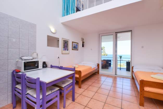 Apartment  Vitorio 3 - located by the beach of Vladarka Bay for 3 people in Mali Lošinj, Croatia.