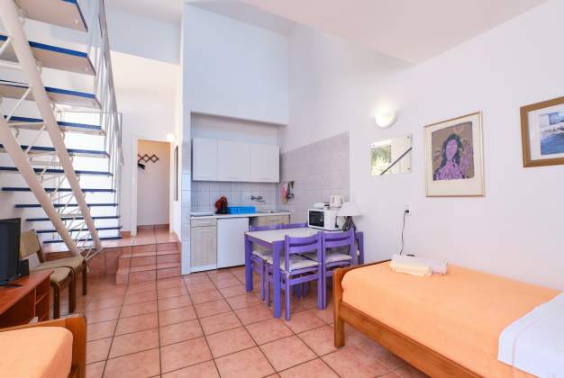 Apartment  Vitorio 3 - located by the beach of Vladarka Bay for 3 people in Mali Lošinj, Croatia.