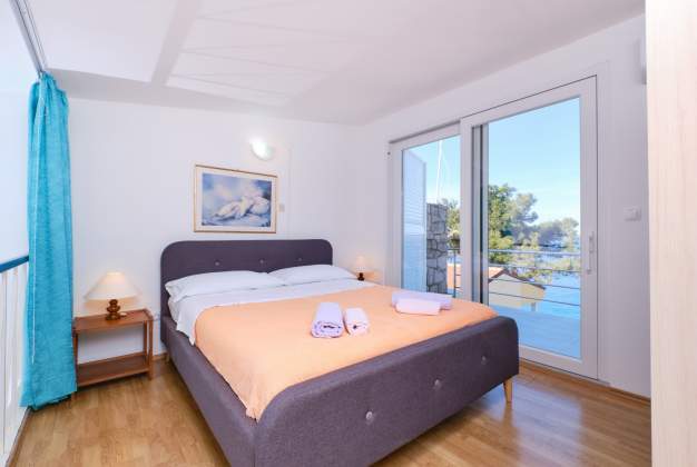 Apartman Vitorio 3 - smješten uz plažu uvale Vladarke za 3 osobe Mali Lošinj, Hrvatska.