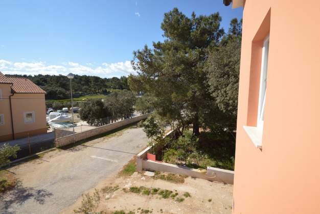 Apartment Duje 3 - Spacious stay near beach, terrace with BBQ in Artatore, Mali Lošinj